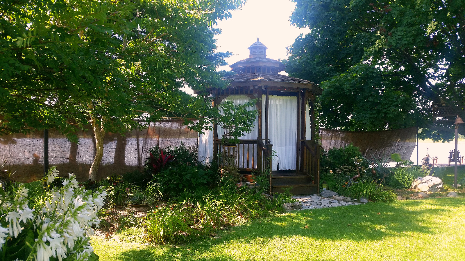 Brown pre-Ceremony privacy curtains for Cedar Gazebo